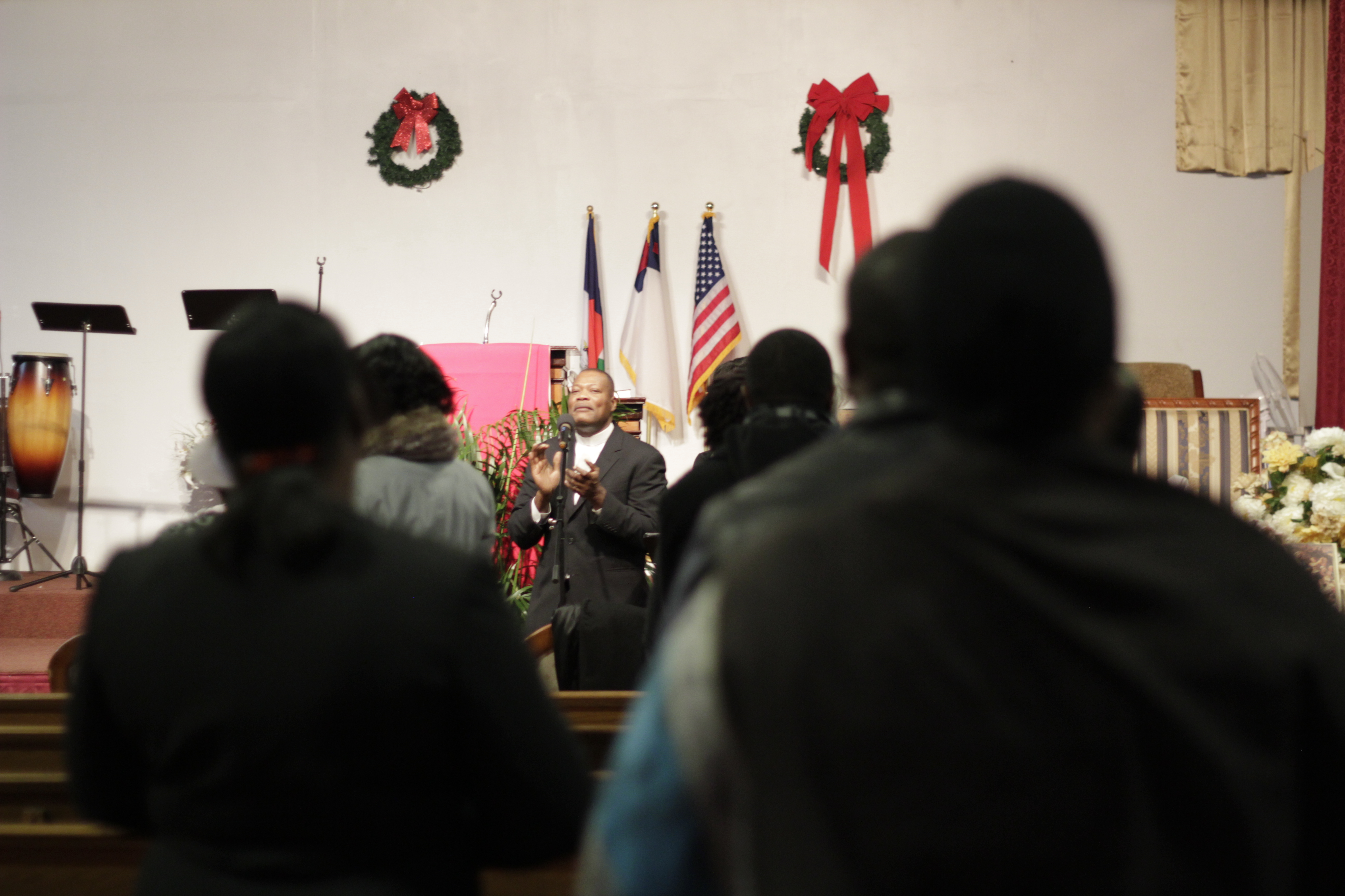 On December 10th, 2017, members of the haitian community in Mattapan, Boston, attend mass at the Church of The Gospel Tabernacle, and pray for 59,000 haitian TPS holders.